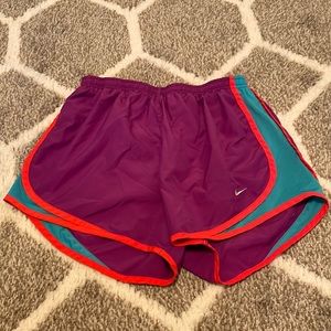 Purple Nike running shorts